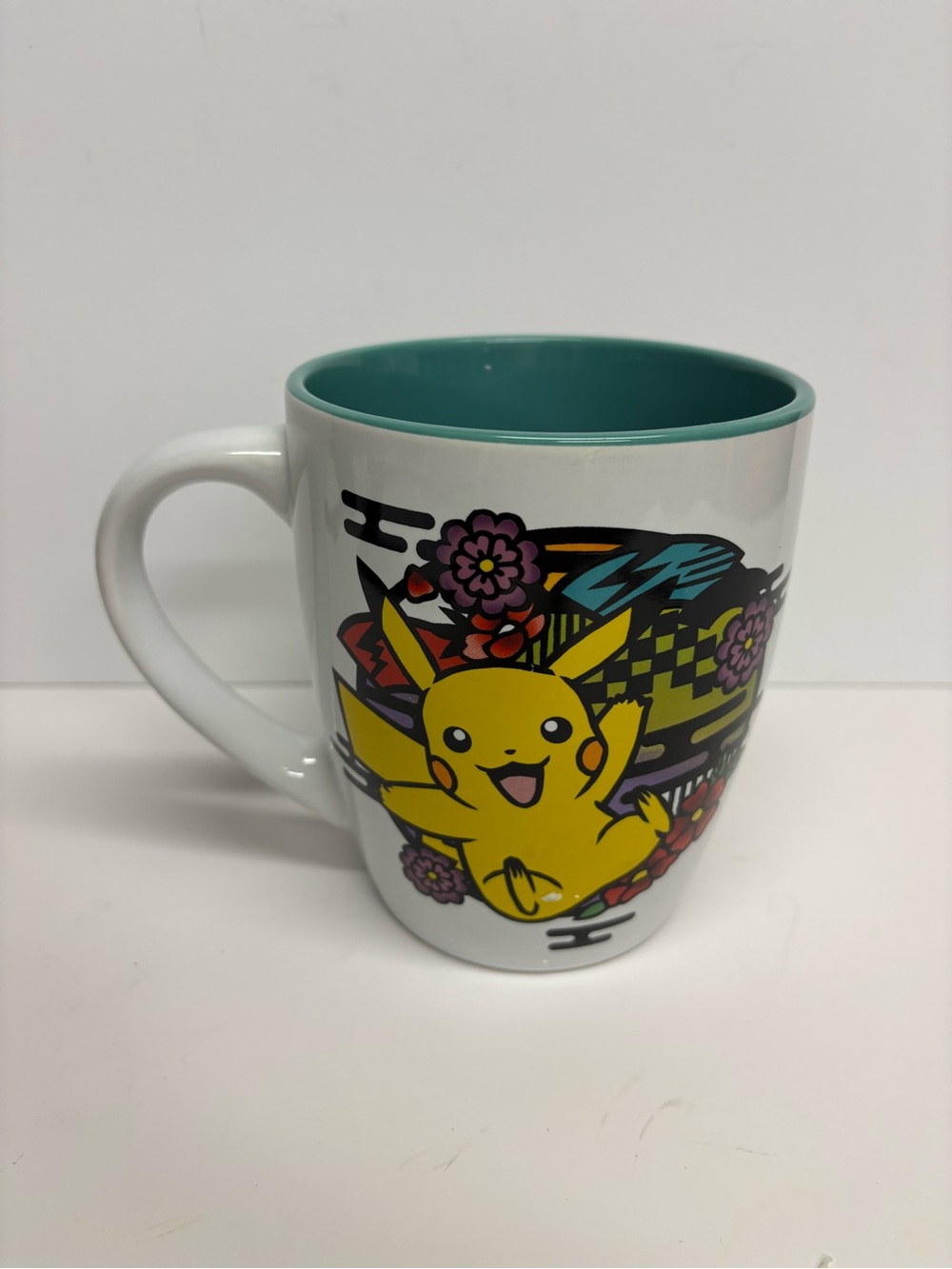 GameStop Pokémon Pika Floral  Ceramic Mug - White with Teal Interior 25OZ